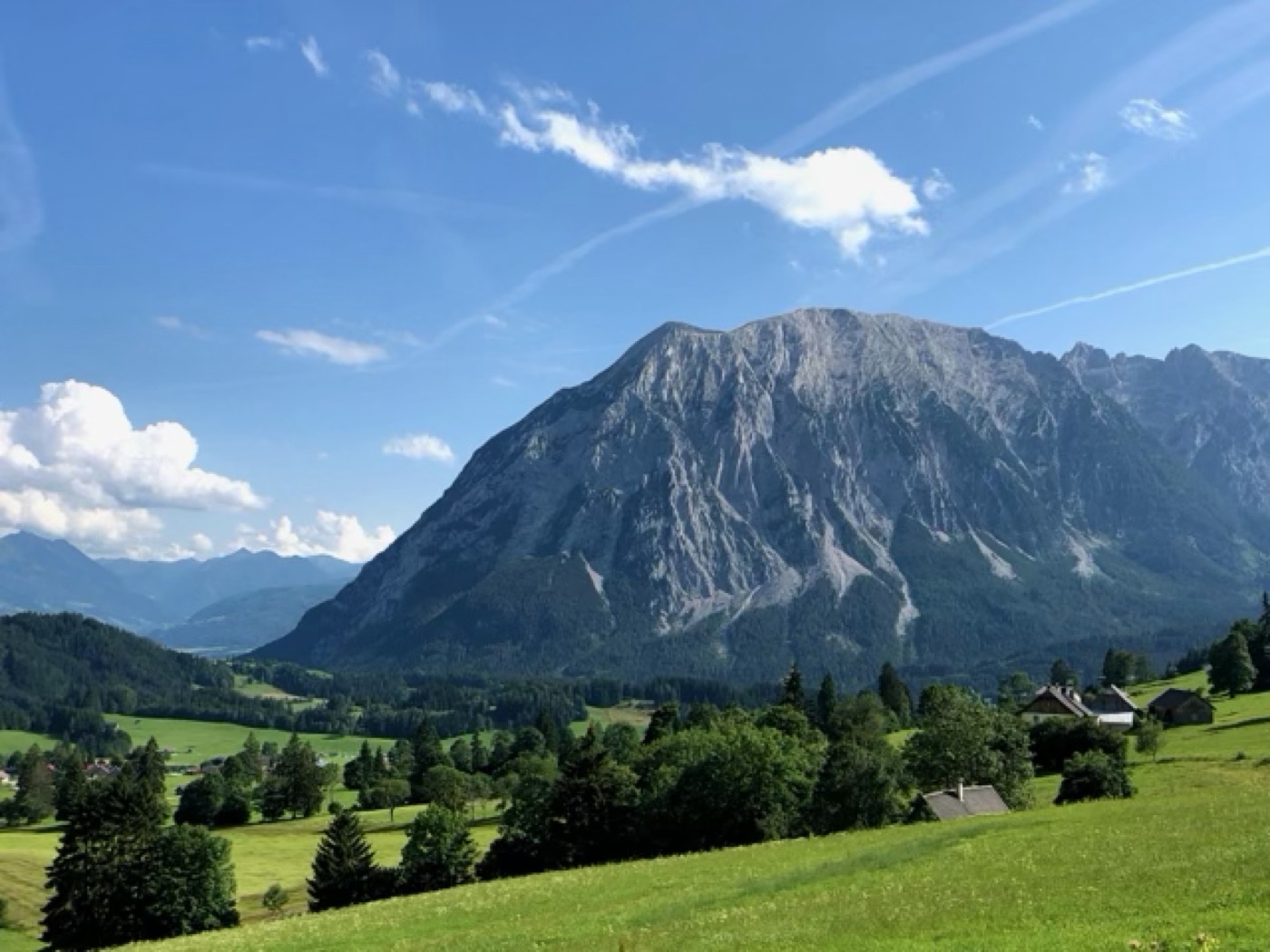 The Grimming over the green valley on a clear summer morning