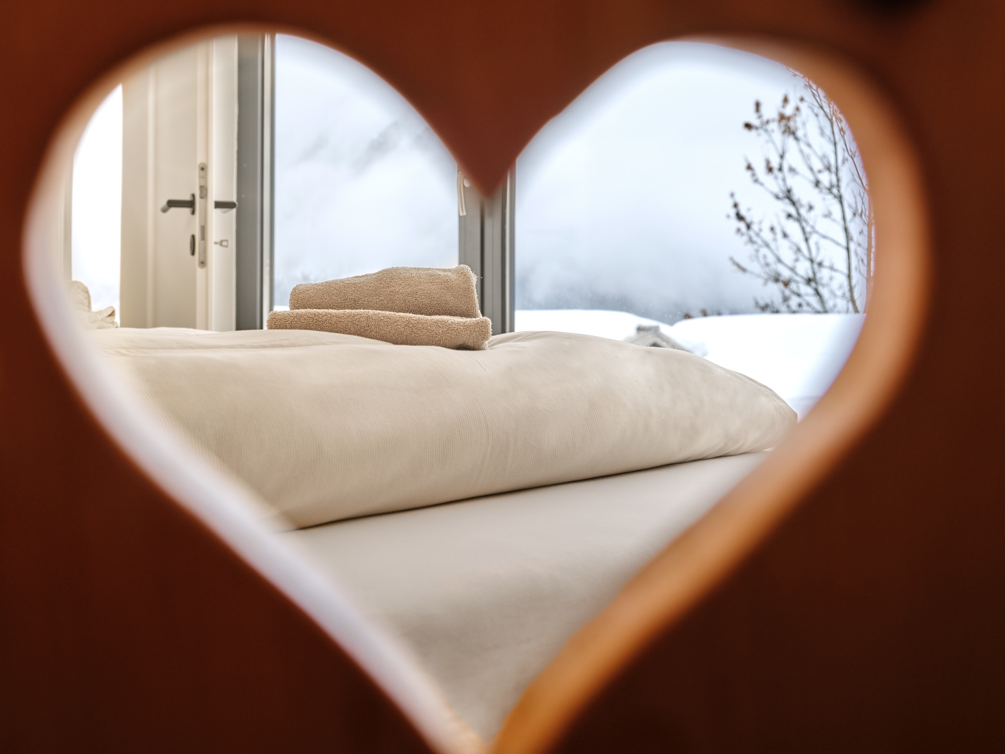 Snow through the heart of a shutter